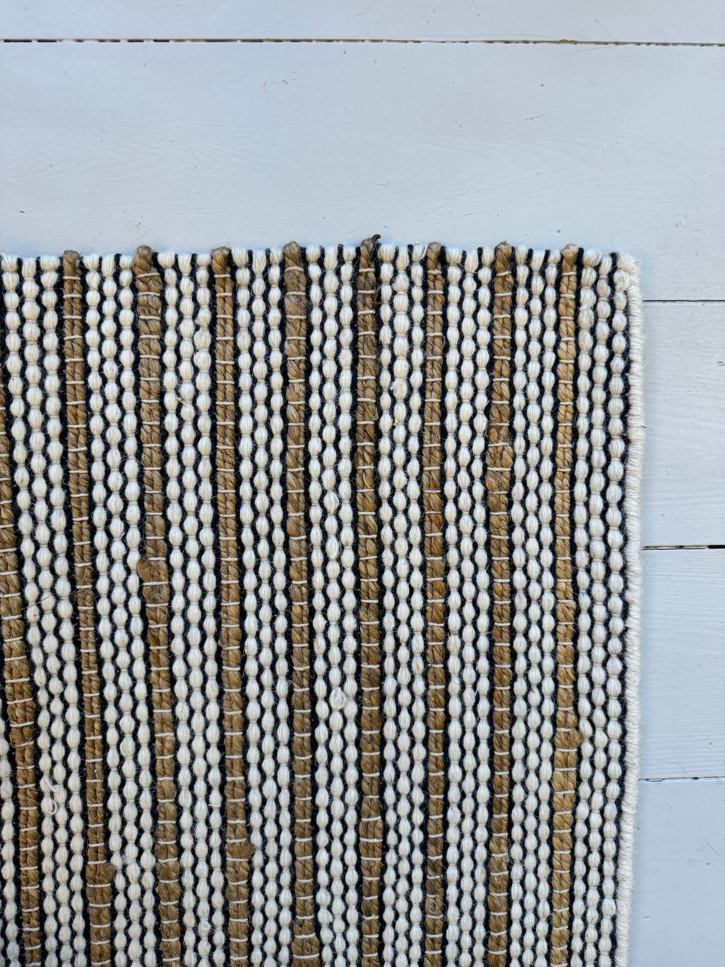 Vera løber af jute og uld