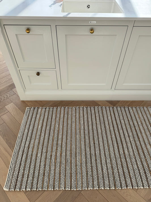 Vera løber af jute og uld